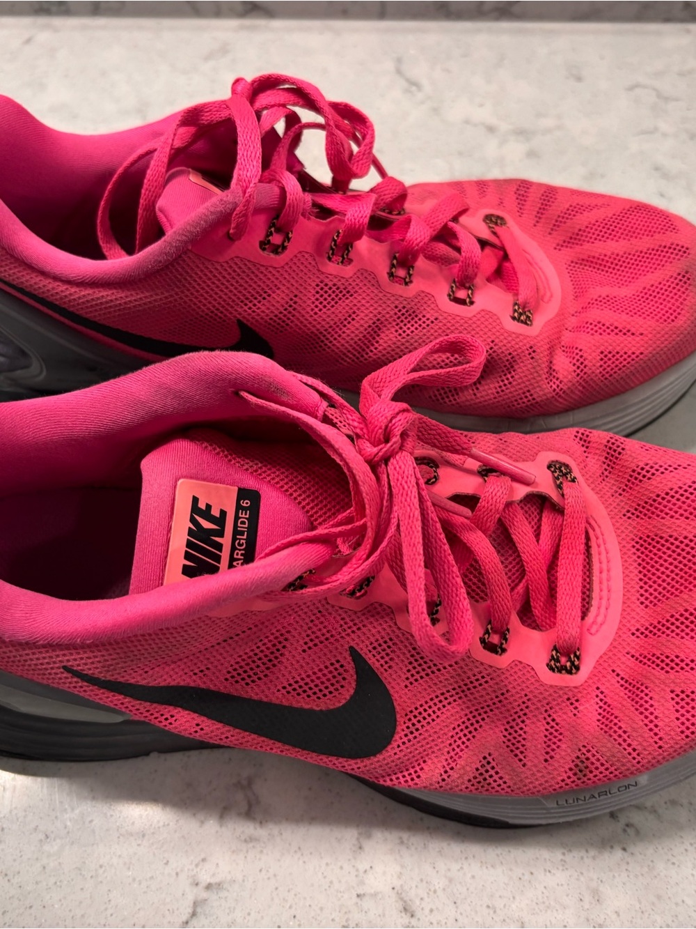 Nike Women’s Hot Pink Athletic Running Shoes with Black Swoosh